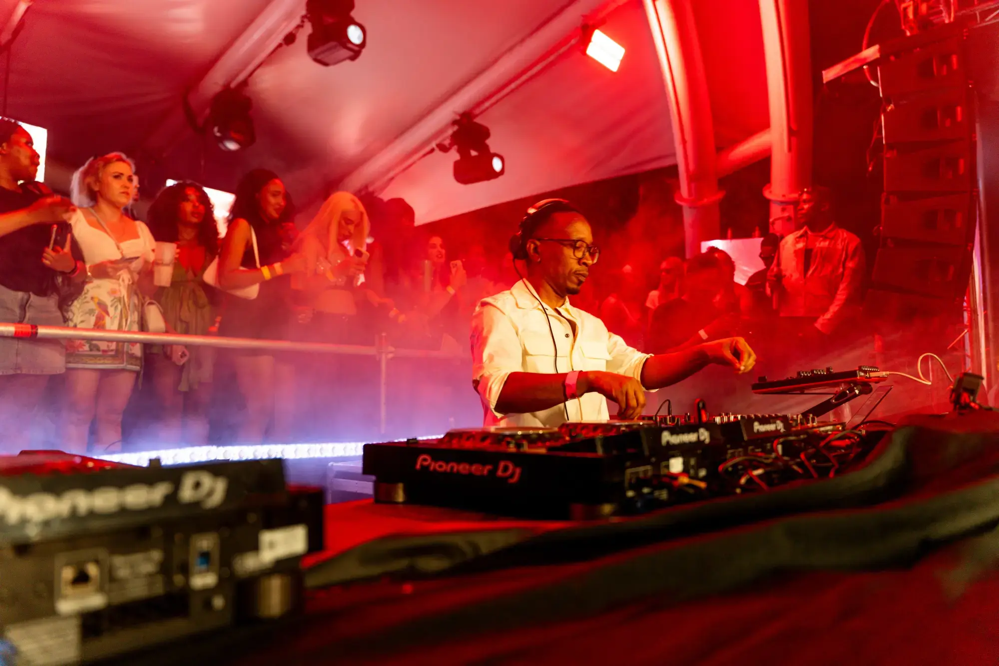 Red Pulse — DJ set bathed in crimson light