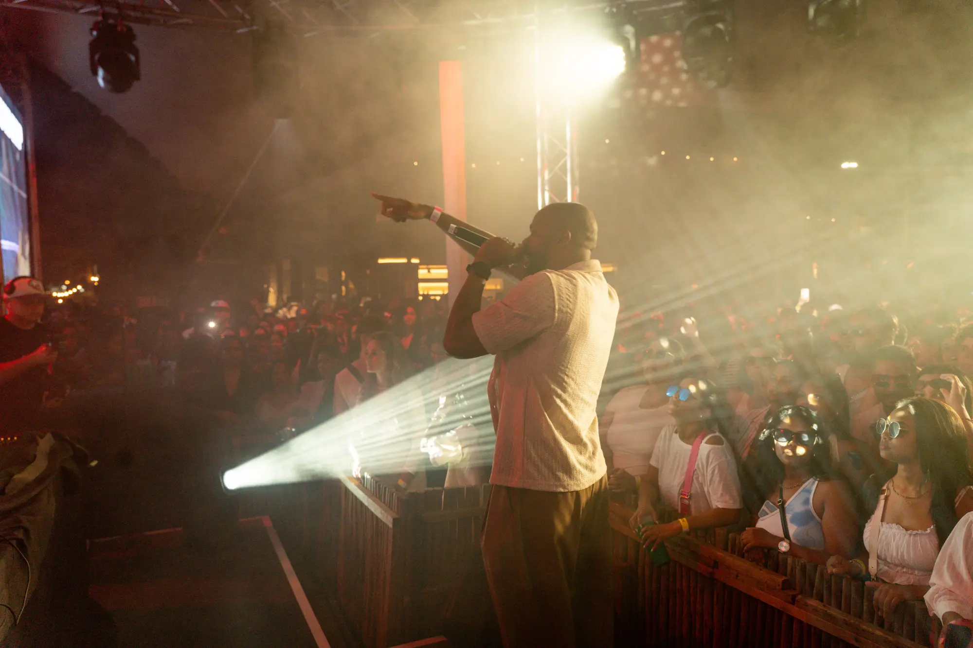 Reaching Out — performing into the light-streaked crowd