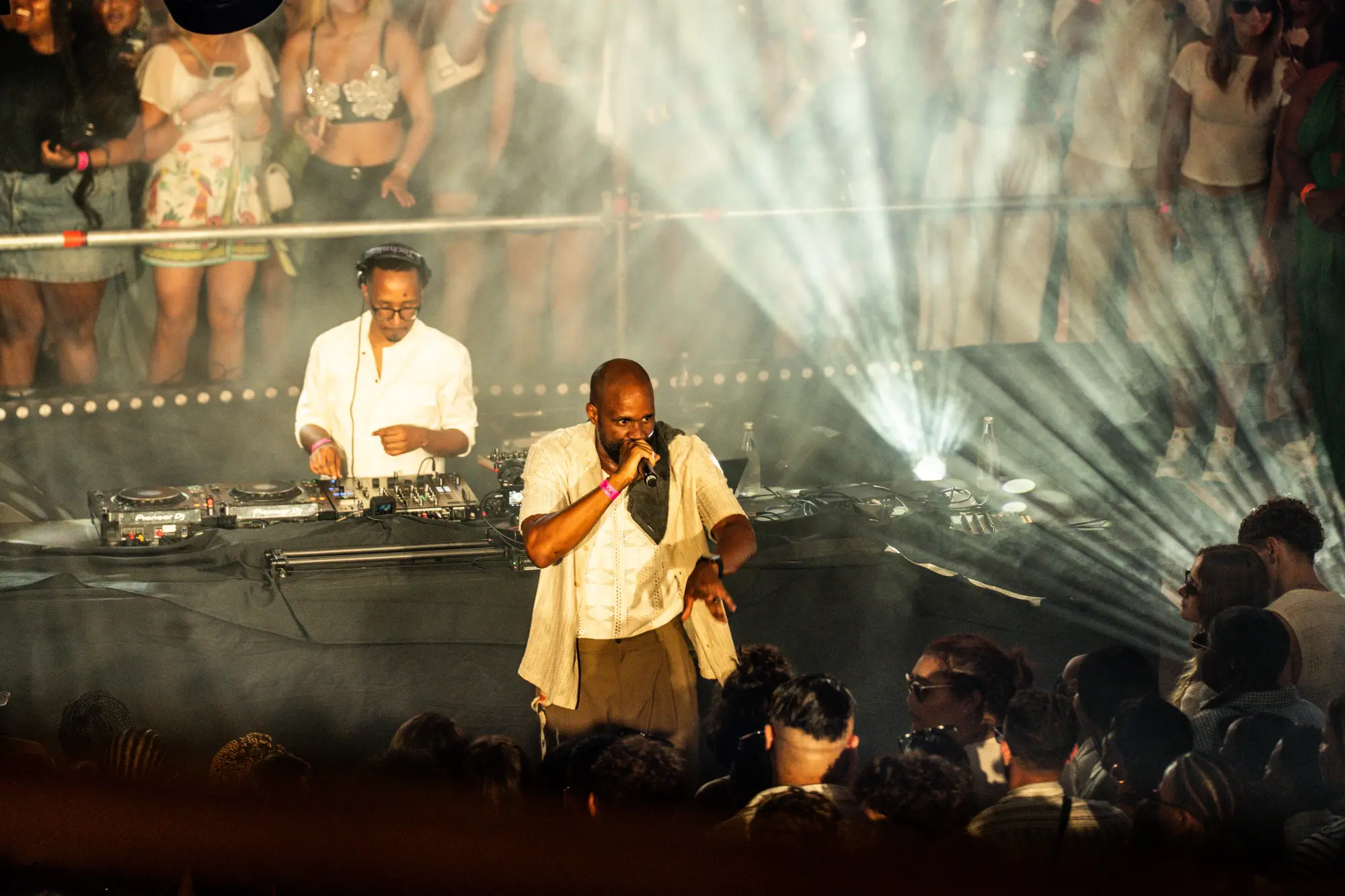 Radiance — both on stage with light rays cutting through