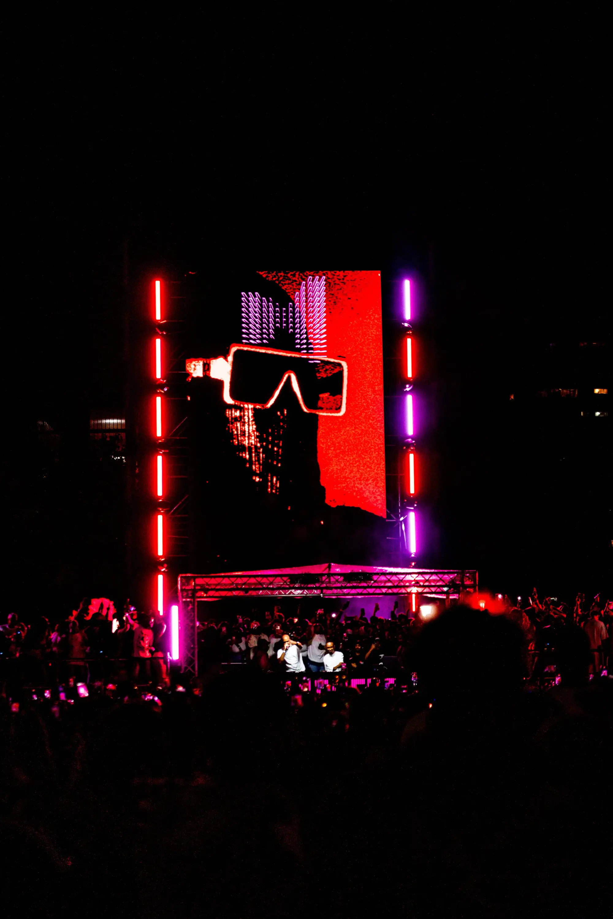 Neon Stage — wide shot with red and purple LED screen
